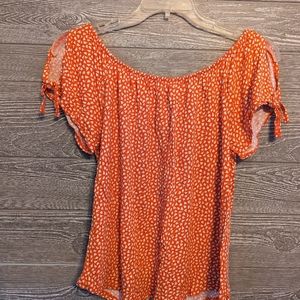 Orange and white blouse